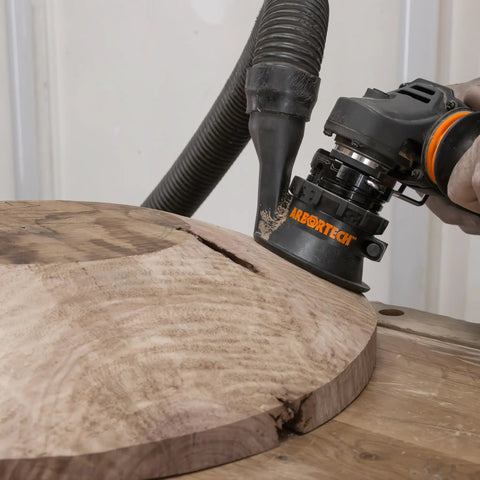 Heavy Duty Power Carving Tool Attachment Featuring A Slick Two Inch Cutting Disc And Adjustable Sanding System shaping wood bowl surface.