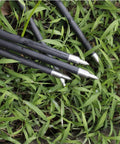 Beefy 100 125 150 175 200 Grain Stainless Steel Field Points Set on grass, showing arrow tips and shaft compatibility.