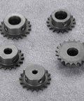 Five 25 Tooth Roller Chain Sprockets For ISO 04C, 8mm Bore, 53.5mm OD, C45 Carbon Steel on grey surface