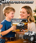 Child holding All Terrain Remote Control Truck Beast With 360 Degree Spins And Lights Rechargeable RC Car box with parent.