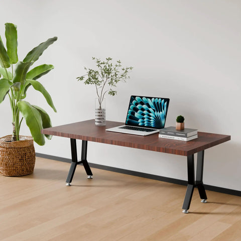 Two 16 Inch Metal Table Legs With Adjustable Leveling Glides Matte Black Finish on modern desk setup in a living room