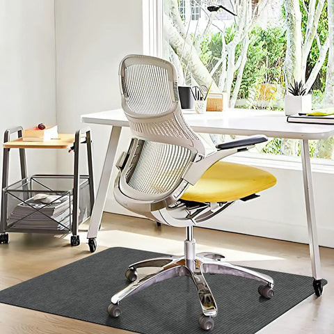 Corduroy Desk Chair Mat For Hardwood Floors, 55 By 35 Inches, under a rolling chair in a home office setting.