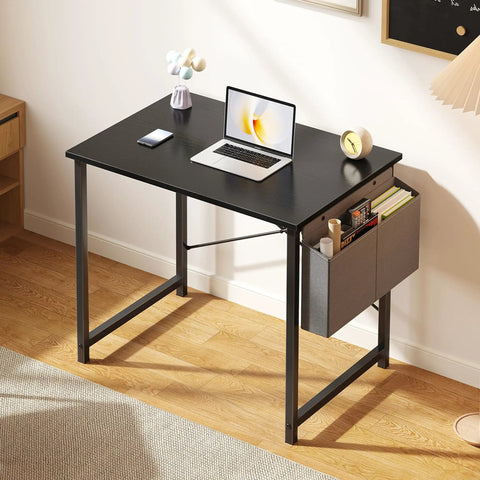 Space Saving Computer Desk For Small Spaces 31 Inch Home Office Table For Gaming And Study With Large Surface And Sturdy Steel Frame Includes Storage Bag For Bedroom Black, featuring a black desk with attached storage bag.