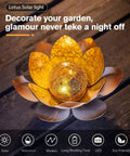 Outdoor Garden Solar Lights 2 Pack Amber Crackle Globe Lotus Decorations Waterproof Orange Metal LED Flower Lights glowing on tabletop