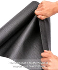 Hands holding non slip grippy tool box and drawer liner with textured grip for scratch and impact protection, foam mat, 16in x 6ft.