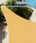 Triangle Sun Shade Sail 12 Foot By 12 Foot By 12 Foot Outdoor Patio Garden Deck Yard Canopy With Ropes Breathable Shade Blocks 95 Percent UV Rays Tear Resistant Fade Resistant Sand installed over patio.