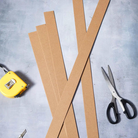 200 Piece Heavy Duty Cardboard Drywall Shims For Straightening Wavy Studs And Lifting Baseboards No Sweat Butt Joint Tuck Rock Solid Kraft Board on workspace.