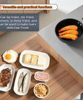 4.7 Inch Mini Frying Pan Nonstick For One Egg Breakfast with shrimp on stove next to assorted dishes on a counter