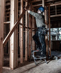 Worker using Lightweight Aluminum 2 Foot Grab And Go Safety Step Stool With Handy Handrail 300 Lb Rating 2 Step Design Type 1A in construction