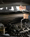 Mechanic using Beefy Three Eighths Inch Drive Speeder Handle, 16.75 Inch Length, Ball Detent Socket Retention in engine bay