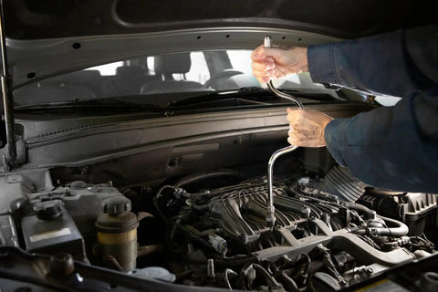 Mechanic using Beefy Three Eighths Inch Drive Speeder Handle, 16.75 Inch Length, Ball Detent Socket Retention in engine bay