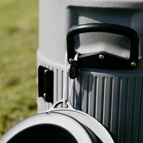 Close-up of Five Gallon Portable Sports Cooler And Water Dispenser With Flat Seat Lid Tailgate Ready in gray with reinforced handle