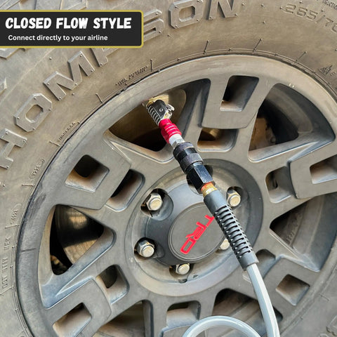 Lightning S2 Quick Connect Tire Air Chuck 1 Quarter Inch F-NPT Closed Flow Self Locking Nozzle attached to Schrader valve on car tire