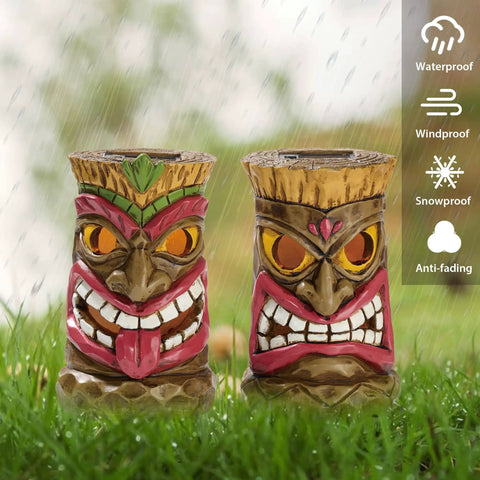 Tiki Head Garden Decor With Solar Outdoor Light Set Of 2 Tropical Hawaiian Resin Yard Sculptures Tiki Torch Statues For Patio Or Lawn Colorful Outdoor Decor Great Holiday Gift 6 Inches shown in an outdoor setting