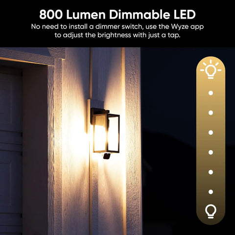Bulb Cam 2K HD Smart Security Light With Color Night Vision, 800 Lumen Dimmable LED installed outdoors on a wall at night