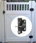 LokkLatch Keyed Gate Latch With Adjustable Fit For Wood Metal And Vinyl Gates, Black Weather Resistant Polymer Construction, Secure Pool Fence Access, Keeps Kids And Pets Safe, 4 9/16 Inch Gap Range installed on white vinyl gate.