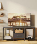 Slick Industrial TV Stand With Fabric Drawer For Fifty Five Inch TV Sweet Entertainment Center displaying a TV, storage, and gaming console.