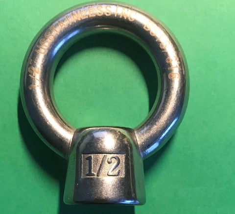 Marine Grade 316 Stainless Steel Lifting Eye Nut One Half Inch UNC Thread With Pitch 13 for heavy duty use on green background