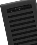 Close-up of Montezuma 4 By 10 Inch Decorative Floor Register in black iron, showing durable steel faceplate and airflow control vent.