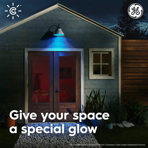 Outdoor view of a wooden house with blue lighting from Cync Smart LED Bulbs With Color Changing Lights Bluetooth And WiFi Control No Fuss Setup