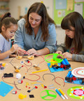 Children learning with Seven In One STEM Kit For Kids Ages Eight To Twelve with electric motor, exploring experiments in classroom.