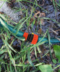 Two Pack One Half To Three Quarter Inch Garden Hose Repair Menders Connectors Adapters For Quick Leak Proof Repair And Extension Of Your Water Hose With Durable ABS Plastic Construction connecting hoses in a garden setting