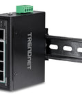 5 Port Industrial Unmanaged Fast Ethernet PoE Plus DIN Rail Switch TI PE50 mounted, showing connections and robust design.