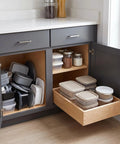 Heavy Duty Pull Out Cabinet Drawer Made From Solid 9 Ply Baltic Birch With Dovetail Joints holding storage containers in kitchen.