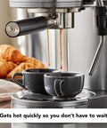 Premium Metal Semi Automatic Espresso Machine With Dual Smart Temp Sensors And 58Mm Commercial Portafilter pouring espresso into two cups.