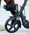 Using Tamper-Proof Torx Bit Set 27-Piece For Impact Drivers on a scooter wheel with impact driver