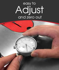A Line It Basic Table Saw Alignment Calibration Tool with Precision Dial Indicator in hand on table saw surface