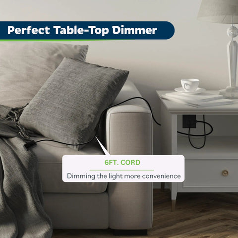 Room setting with a Table Top Plug In Dimmer For Lamps With Quiet Slide Control Dims 10 To 100 Percent 6 ft cord on a table