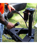 Person connecting 12 Volt Electric Trailer Jack For RVs And Trailers, 3500 Lb Tongue Weight, Pre Wired 7 Way RV Connector on A-frame