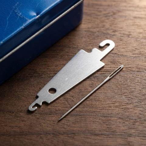 Stainless Steel Needle Threader Kit For Seniors Easy Quick Threading Tool For Stitching Quilting And Crafting 60 Piece Kit Durable Hand Sewing Aid For Everyday Use, stainless steel tool and threader on wood