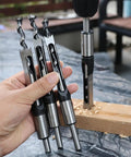Heavy Duty Seven Piece Square Hole Drill Bit Set Forged From Heat Treated Hss Steel With Smooth Operator Mortise Chisel Edges quarter to three quarters inch shown in hand.
