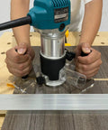 Clear Acrylic Router Base Plate Optimized For Rt0701c And Xtr01z Routers on workbench for precise woodworking tasks.