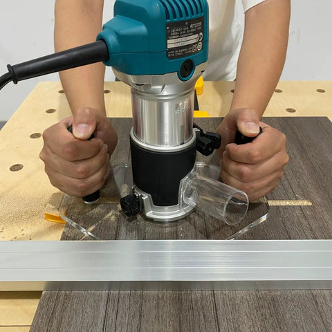 Clear Acrylic Router Base Plate Optimized For Rt0701c And Xtr01z Routers on workbench for precise woodworking tasks.