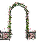 Garden Arbor With Planter Boxes 76 Inch Wide By 86 Inch High Black Metal Archway For Climbing Plants Outdoor Lawn Patio And Backyard Wedding Ceremony Entrance adorned with pink flowers.