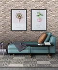 Room with Peel And Stick 3D Foam Wall Panels Set Of 10 Faux Brick And Stone Wallpaper Tiles, rock color, behind couch and decor.