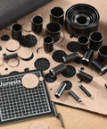 Leather Circle Cutter Tool Set With 31 Circle Punch Dies, alloy steel cuts for DIY leather, vinyl, and fabric projects on cutting board.