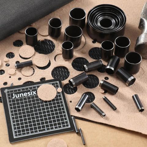 Leather Circle Cutter Tool Set With 31 Circle Punch Dies, alloy steel cuts for DIY leather, vinyl, and fabric projects on cutting board.