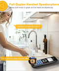 Top Shelf Five Handset Landline Phone System That Straight Up Blocks Spam Calls features full-duplex speakerphone in a kitchen setting.