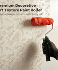 7 Inch Soft Rubber Embossing Paint Roller For Seamless Wall Texturing With Comfort Grip And Reusable Build in use, creating bird pattern texture.