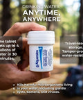Trailhead Ready Water Purification Tablets 397Mg 100 Count in a hand, portable, tamper-proof, for emergency water purification.