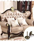 Knockout Bronze Upholstery Tacks For Couch Repairs And DIY Crafts, Dead Nuts Solid Thumb Pins In 11X16Mm Cut, displayed with elegant sofa.