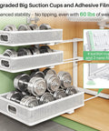 Heavy Duty 2 Pack Under Sink Organizer With Adjustable 3 Tier Metal Pull Out Drawers holding weights in white steel baskets.