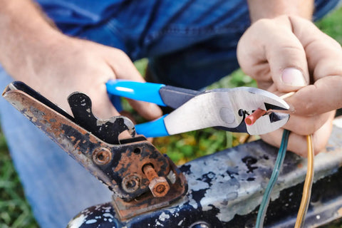 9.5 Inch Wire Crimping Tool For Insulated And Non Insulated Terminals With Center Cut Pliers And Cutter in use on wiring