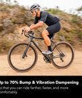 Cyclist riding with ShockStop PRO Suspension Stem For Bikes Shock Absorbing Handlebar Stem For Road Gravel Hybrid And EBikes 6 Degree 90 Mm
