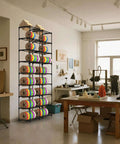 High Capacity 54 Spools Of 1kg 3D Printer Filament Storage Rack with Heavy Duty Metal Spool Holder in a home office workshop.