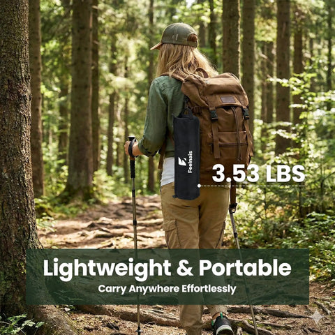 Hiker carrying Ultra Portable Folding Camping Chair, lightweight and compact, ideal for backpacking. Forest trail setting, 3.53 lbs visible.